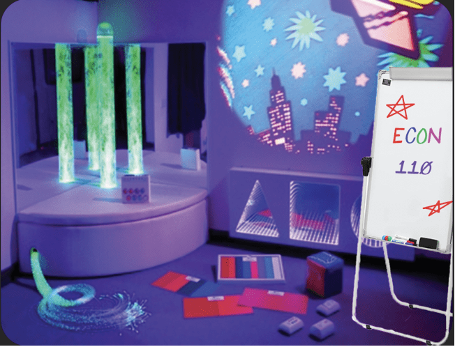 Sensory room with colorful lights and decorations.
